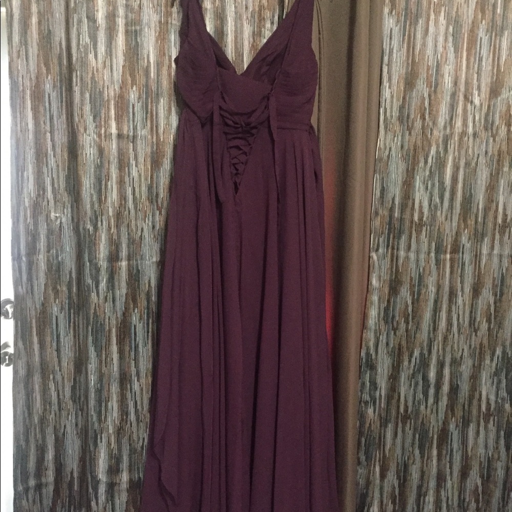 About a 10, maroon color, corset in back